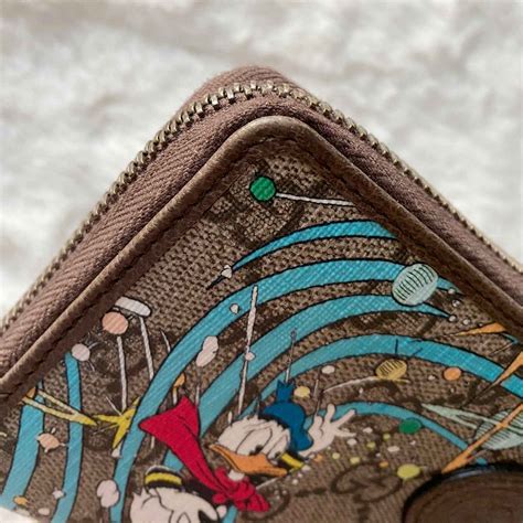 donald duck wallet gucci